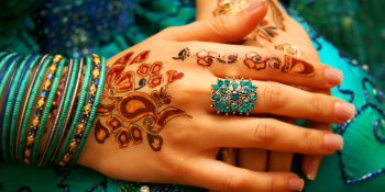 hand with henna tatoos